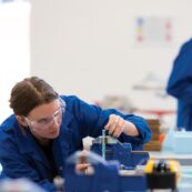 1280x1280 0014 19 Engineering & Design (22) female engineering student using equipment
