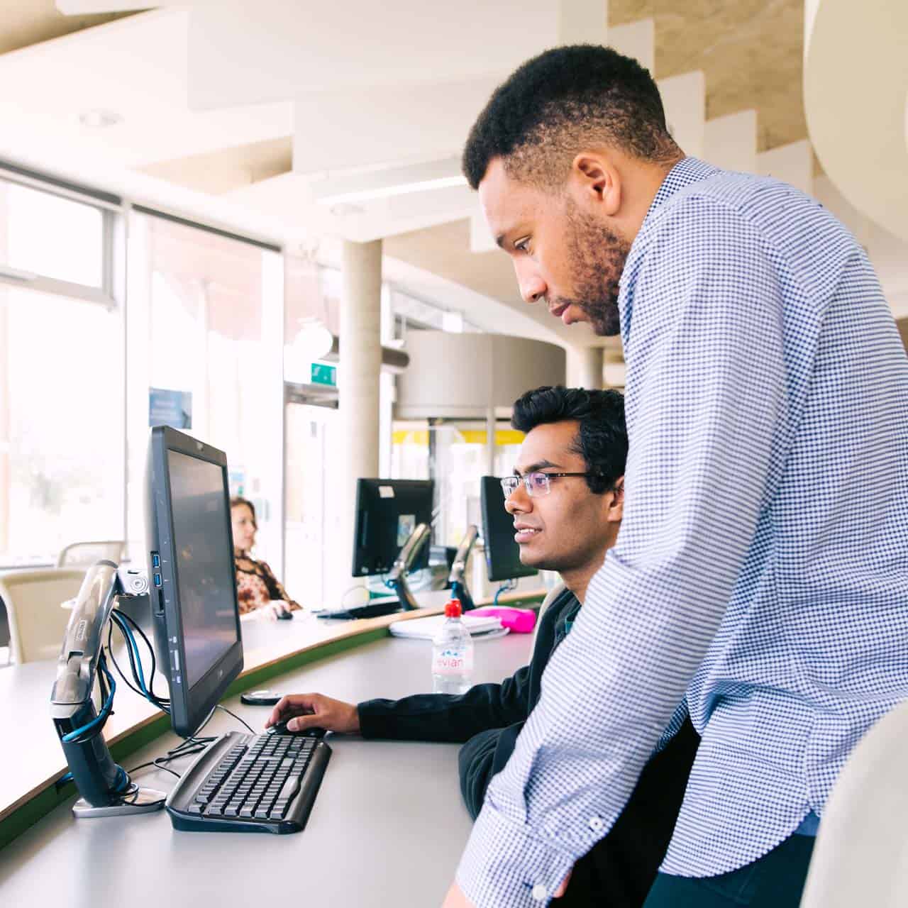 Students working together on a computer