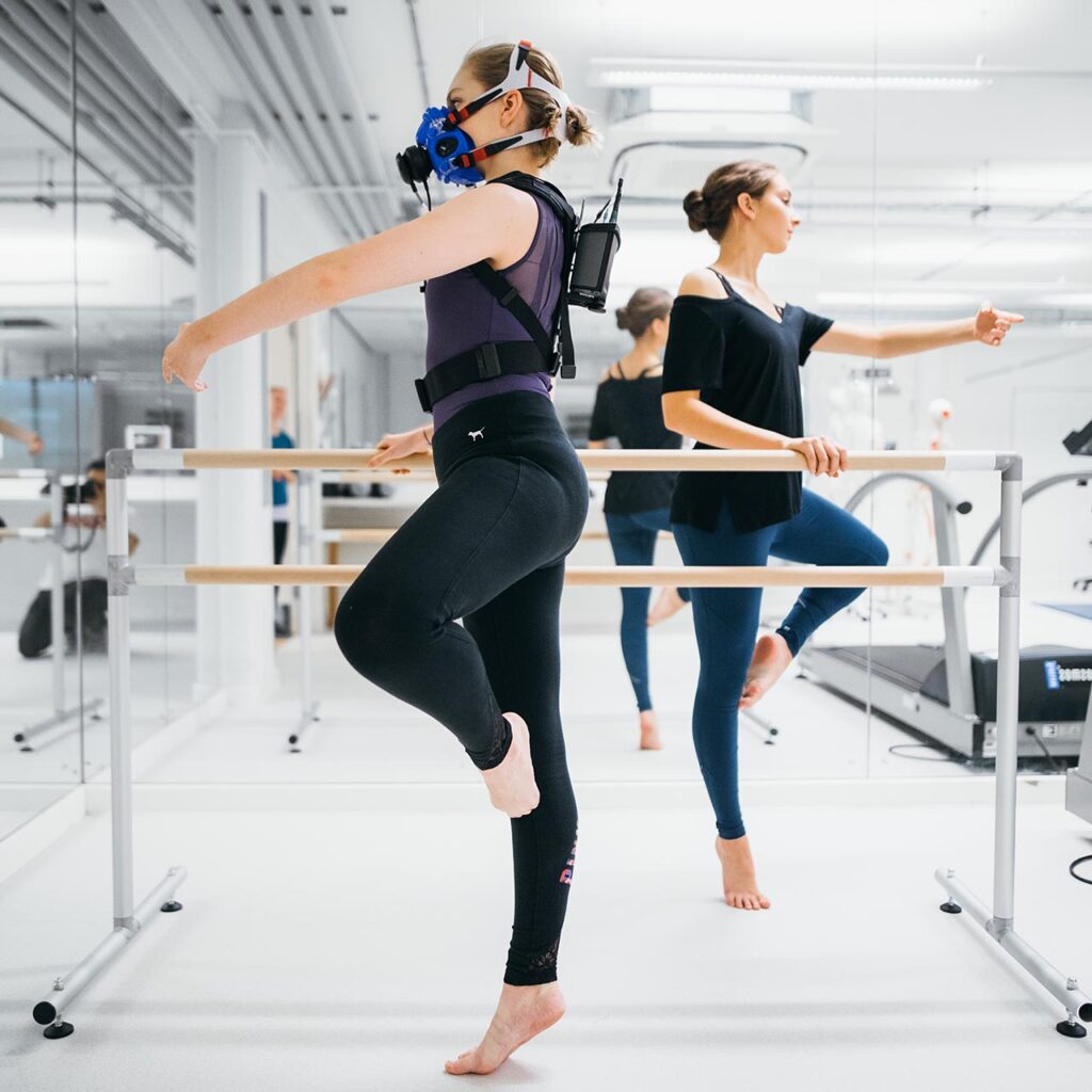 dance science students working with respiratory equipment