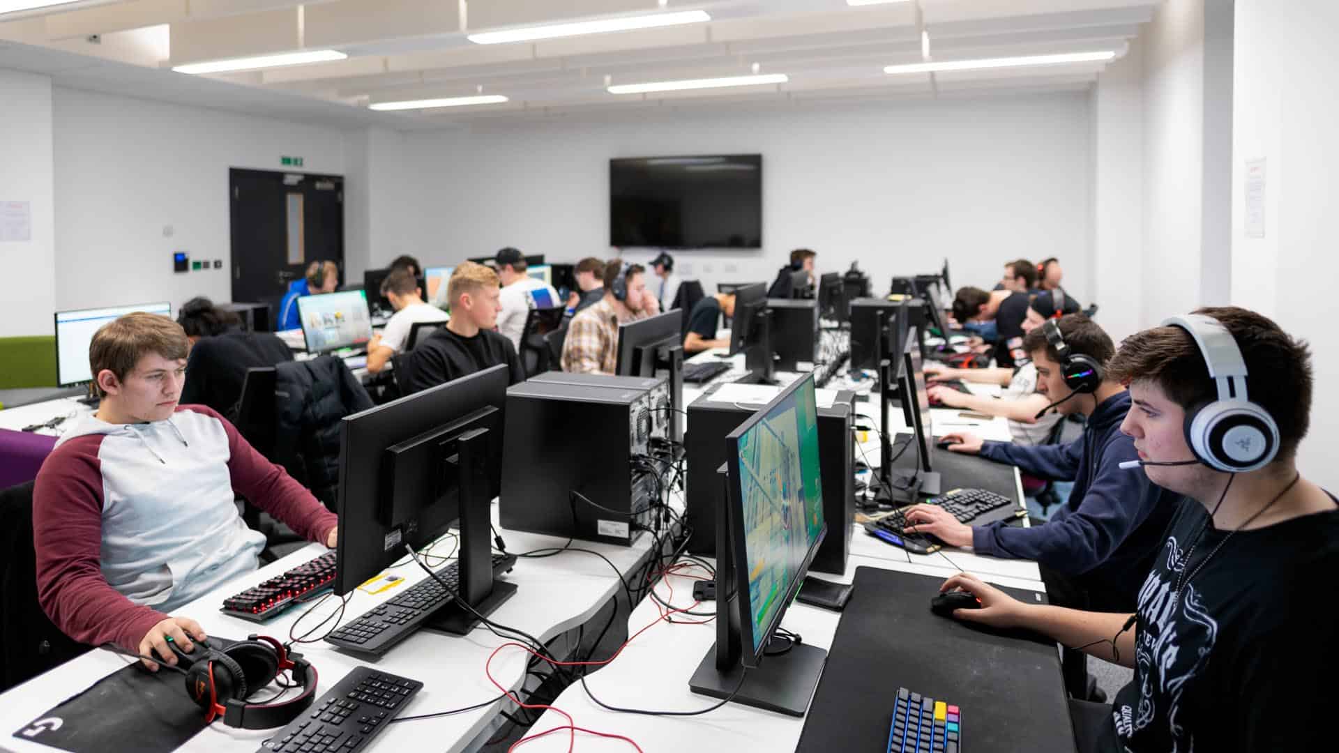 esports students playing games on the computers