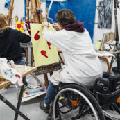 art student painting on a canvas