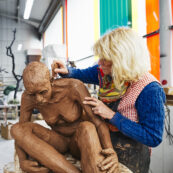 19 Fine Art (43) art student working on a sculpture of a person
