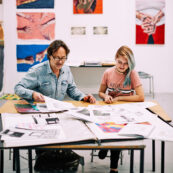 19 Fine Art Interview (8) lecturer looking at a students work in a 1:1