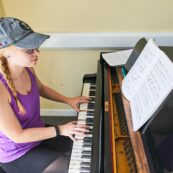 music student playing the piano