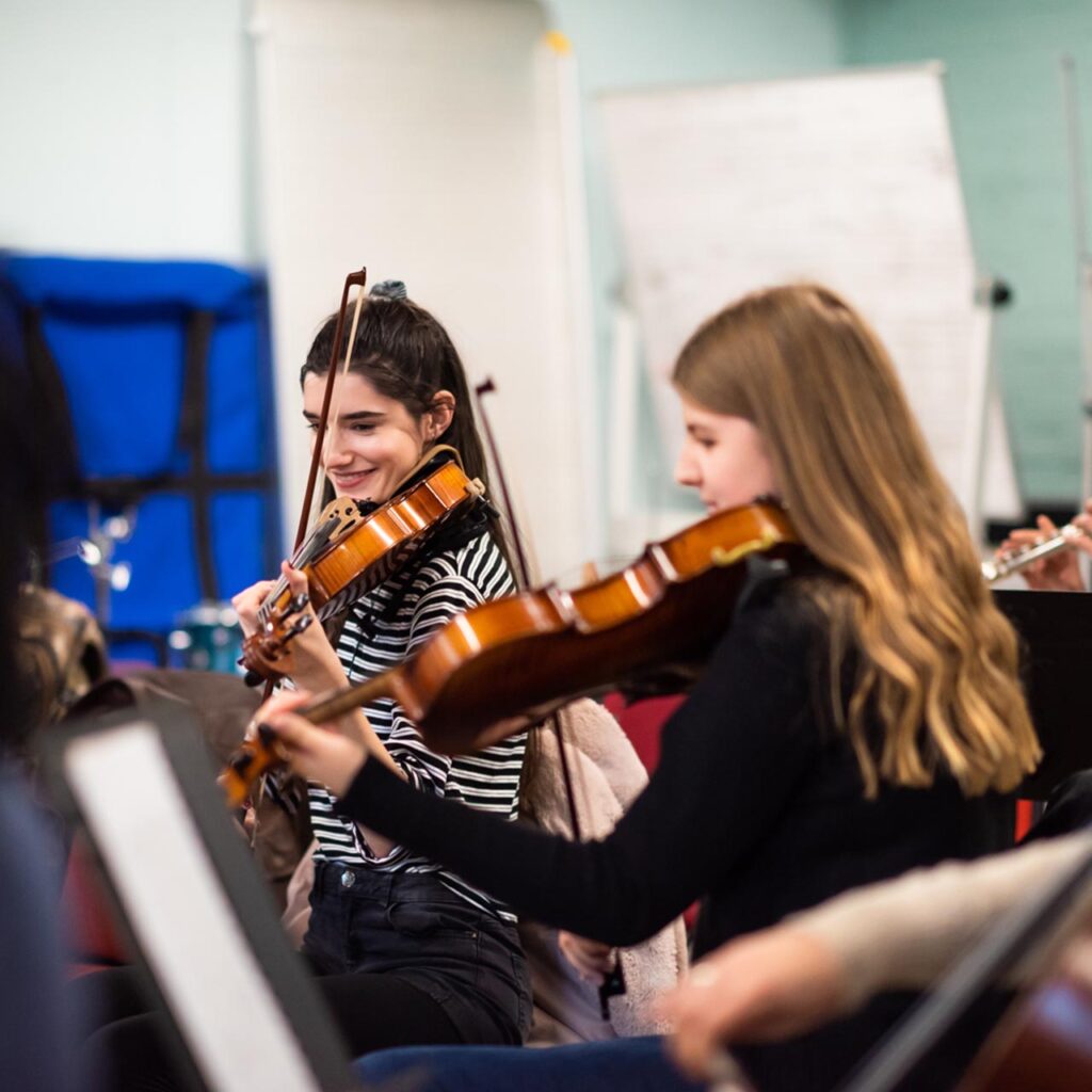 Students rehearsing in study spaces