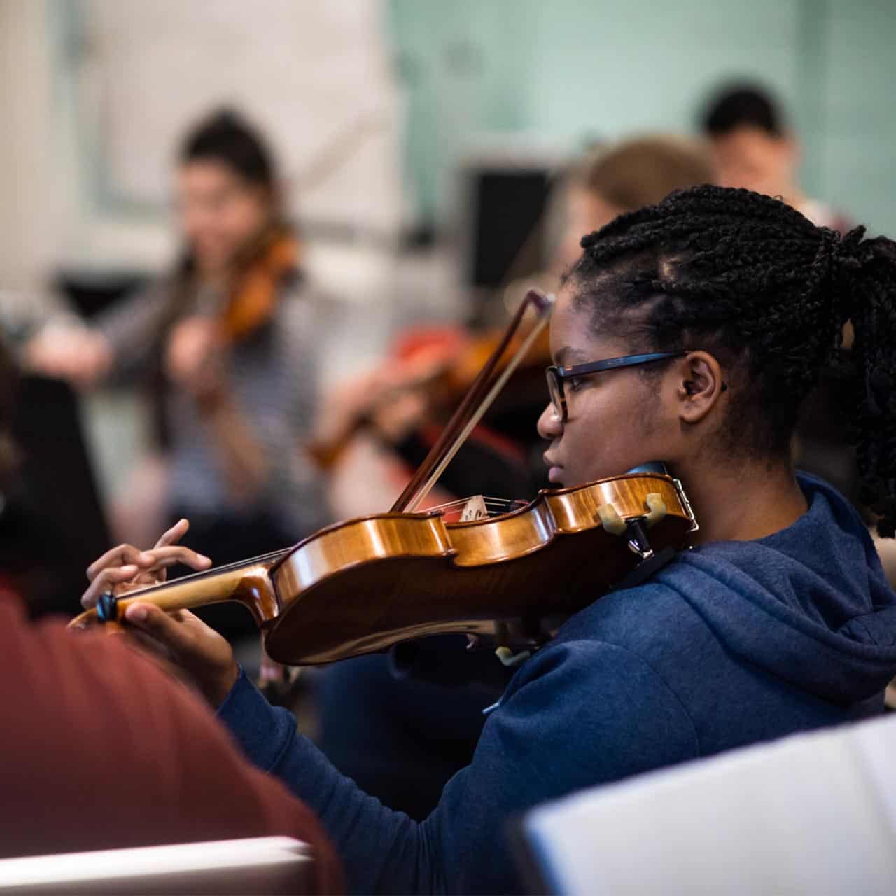 19 Music 1280 X 1280 14 Students rehearing in group