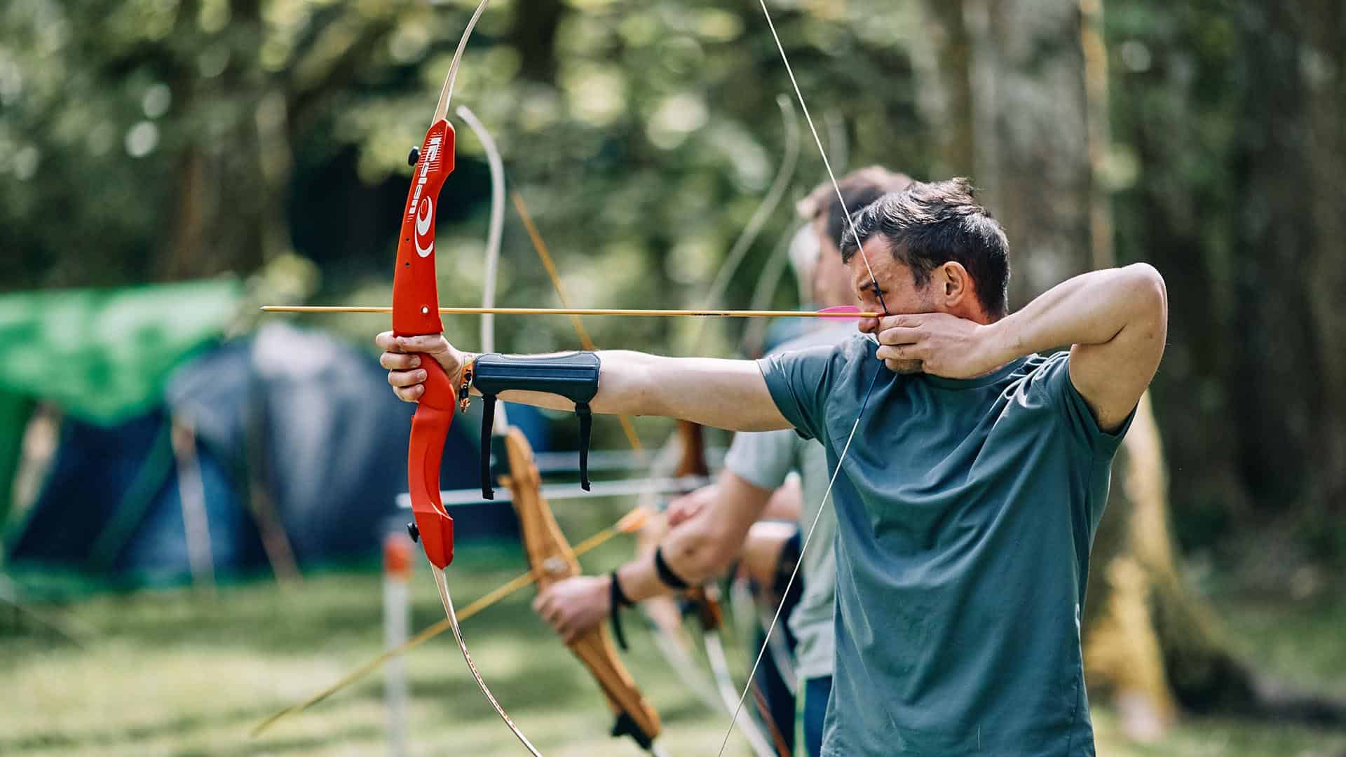 Students learning archery