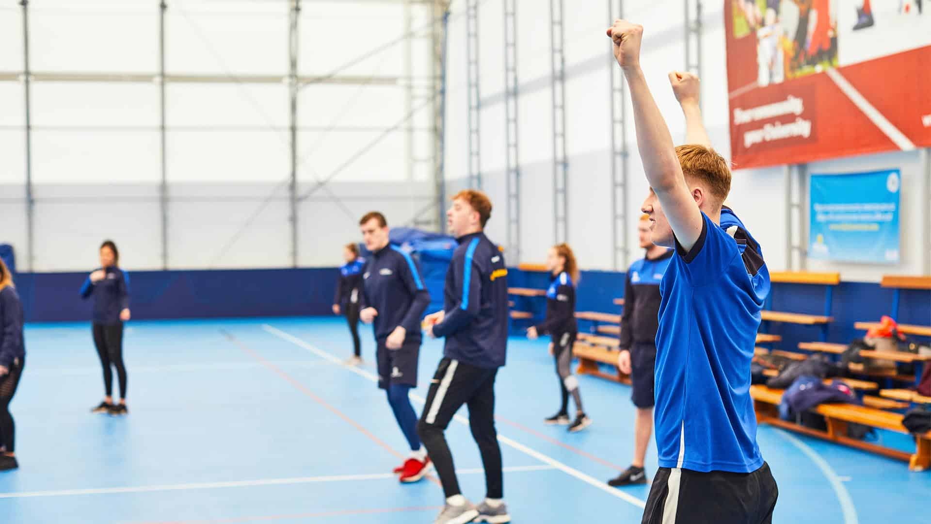 students in the sports dome