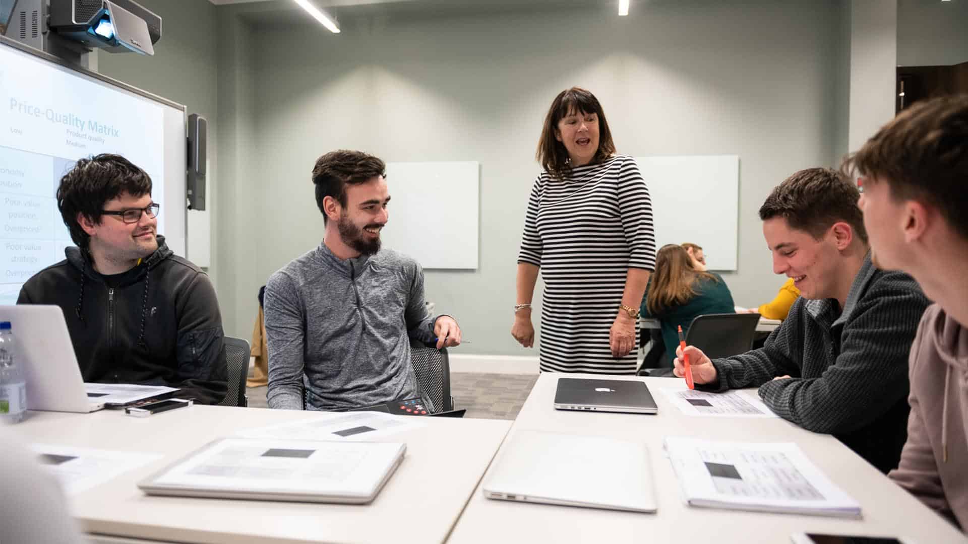 Students discussing topics in seminar