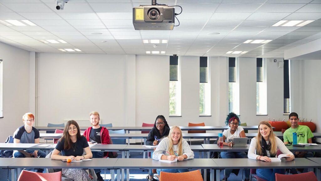 students in classroom doing work