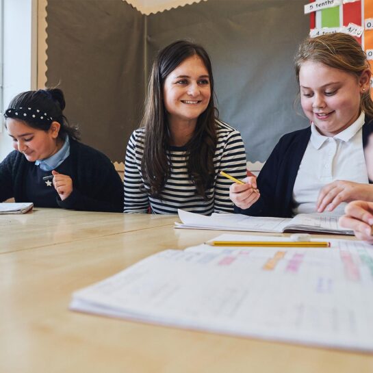 teacher teaching students maths