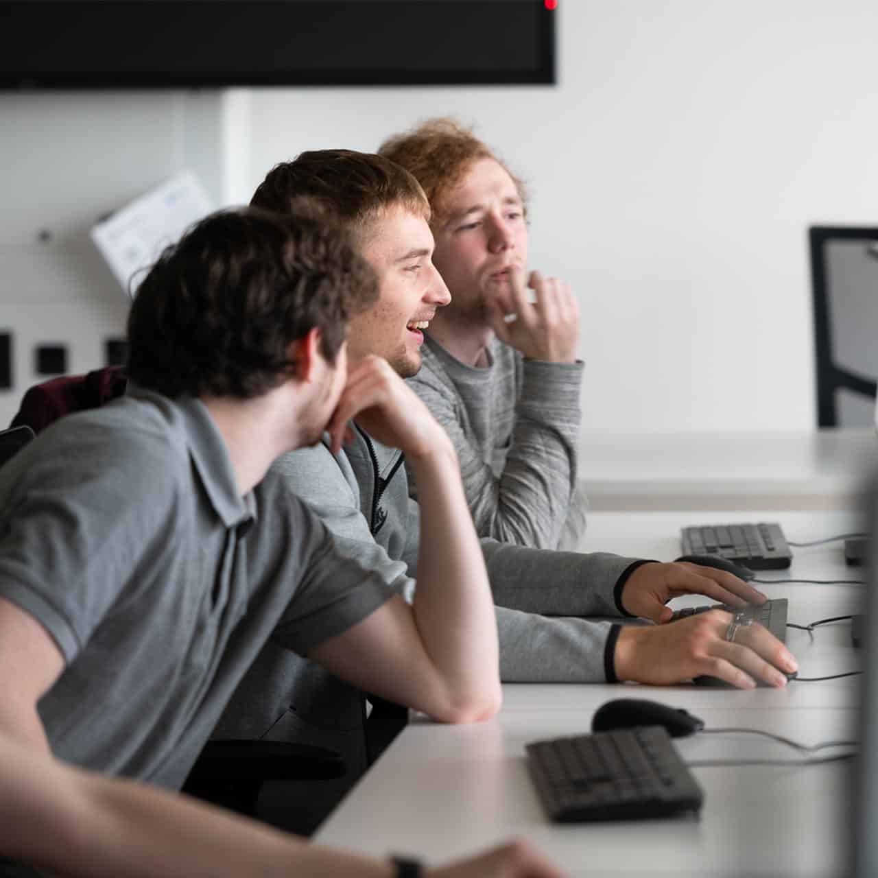 Students working on the computers