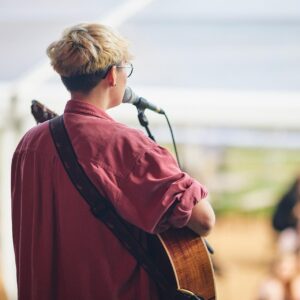 student performing on stage