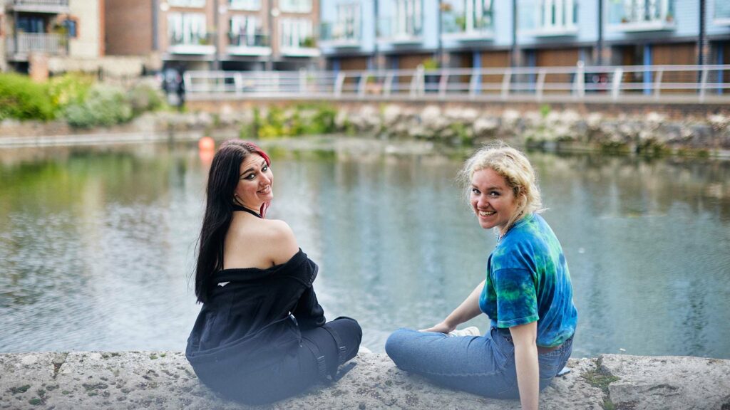 21 Student Chichester Canal 1920 X 1080 29 students sitting by chichester canal