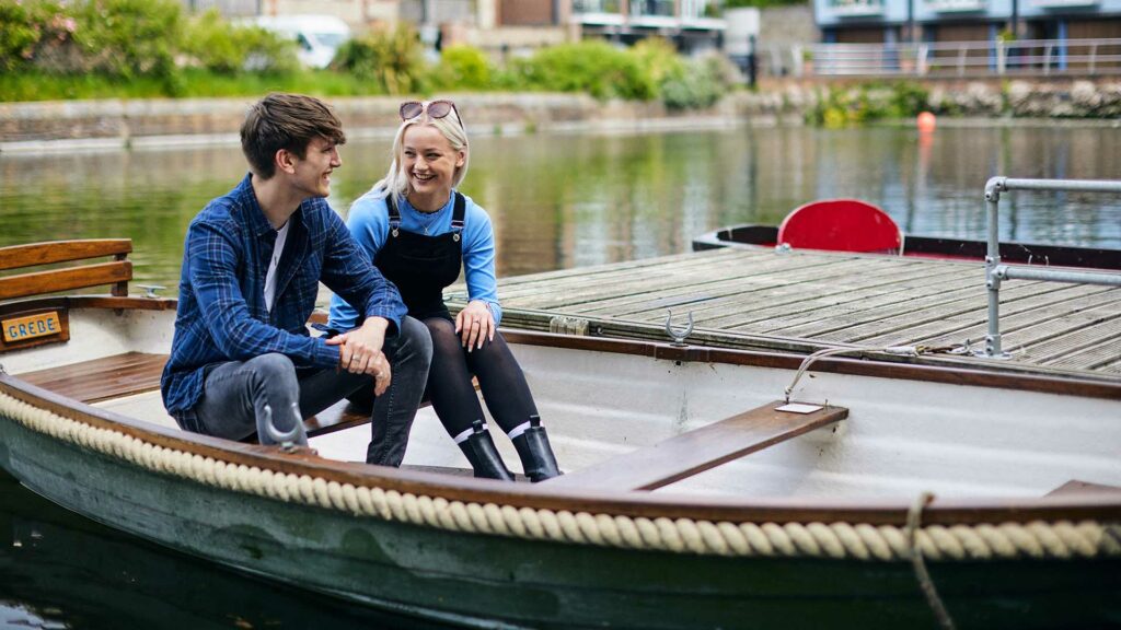 21 Student Chichester Canal 1920 X 1080 47 students sitting on boat at chichester canal