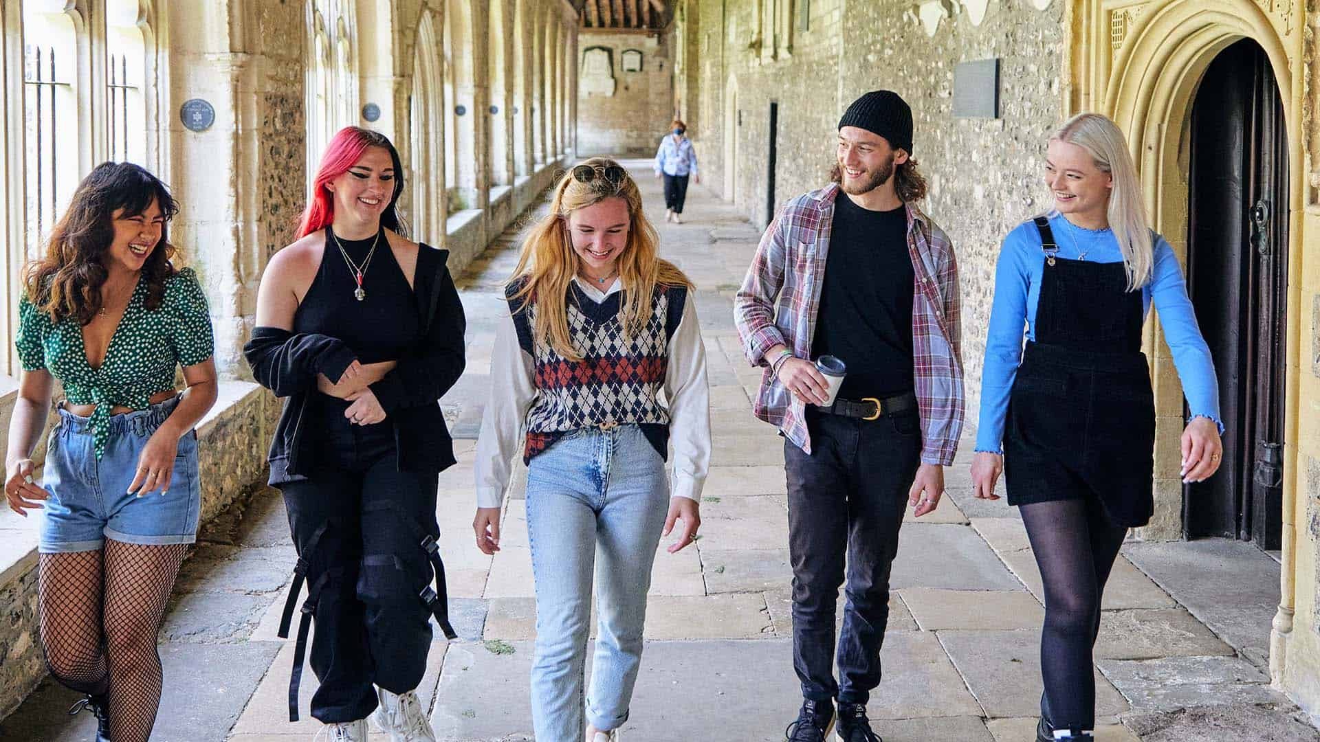 21 Student Chichester Cathedral 1920 X 1080 28 Students walking through Cloisters