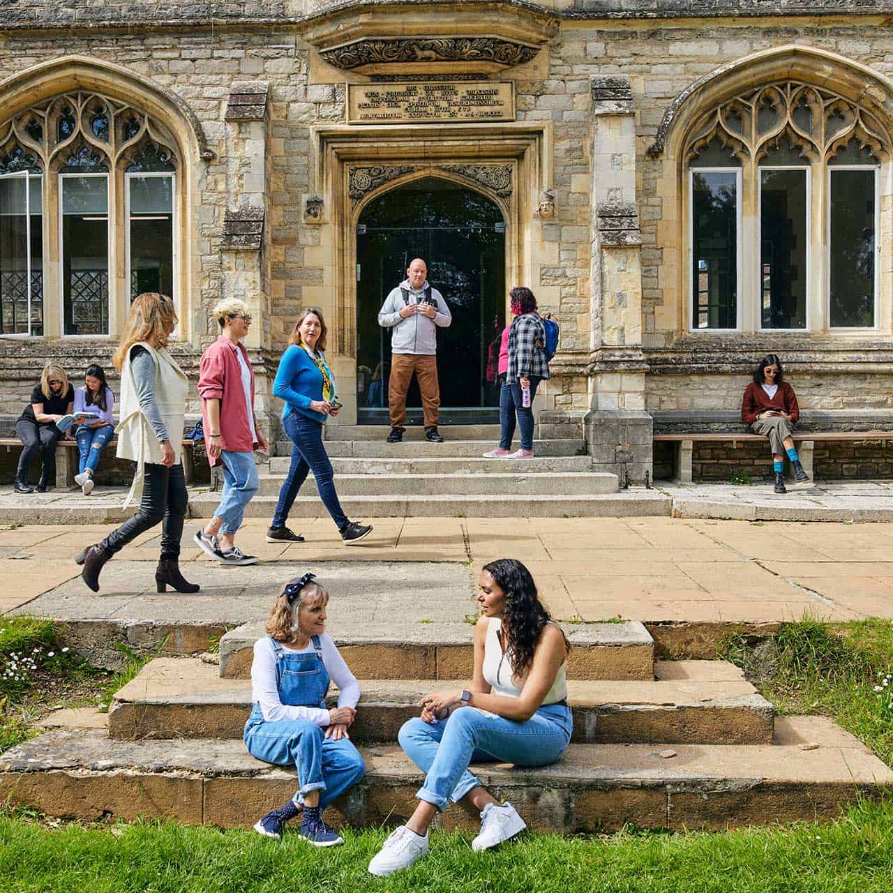 21+ Students BOC 1280 X 1280 13 group of students outside Cloisters
