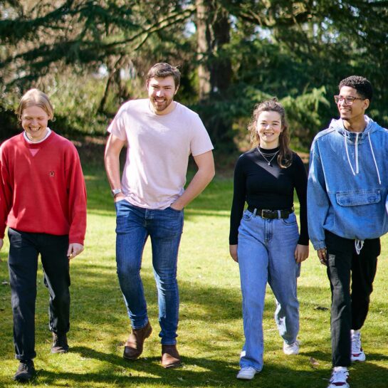 Students smiling in sun