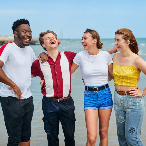 Students laughing at Bognor Beach