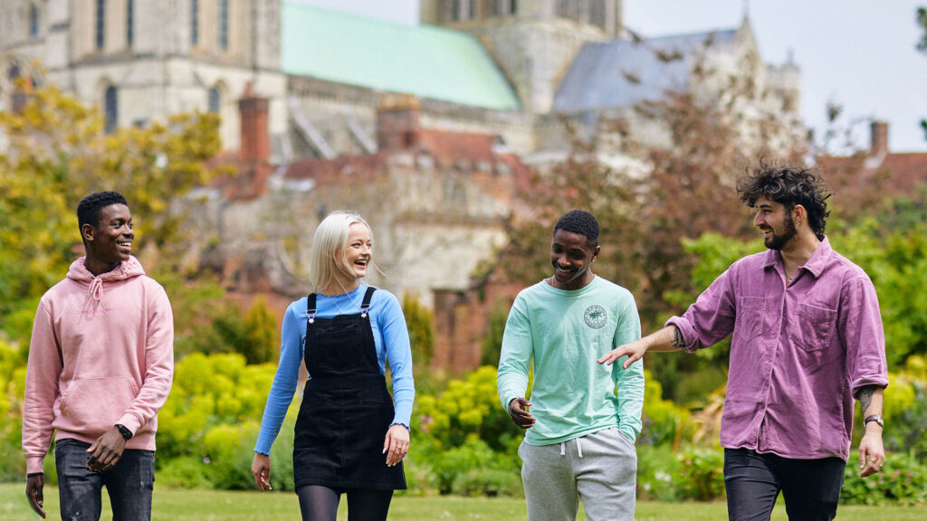 21* Students Cathedral 1920 X 1080 4 Students walking in front of Chichetser Cathedral