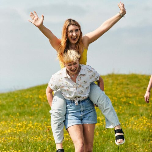 21 Students Chichester Goodwood Trundle 1280 X 1280 12 Students giving piggybacks at Trundle