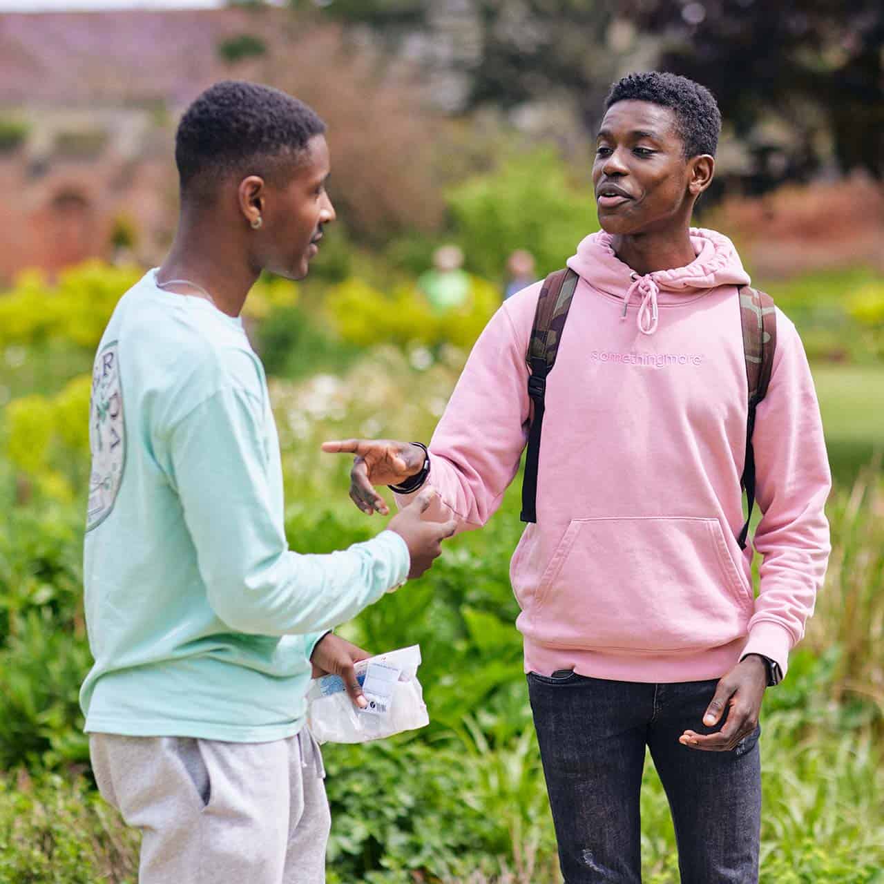 21 Students Chichester Park 1280 X 1280 3 two students in Chichester chatting