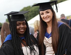 two students at graduation