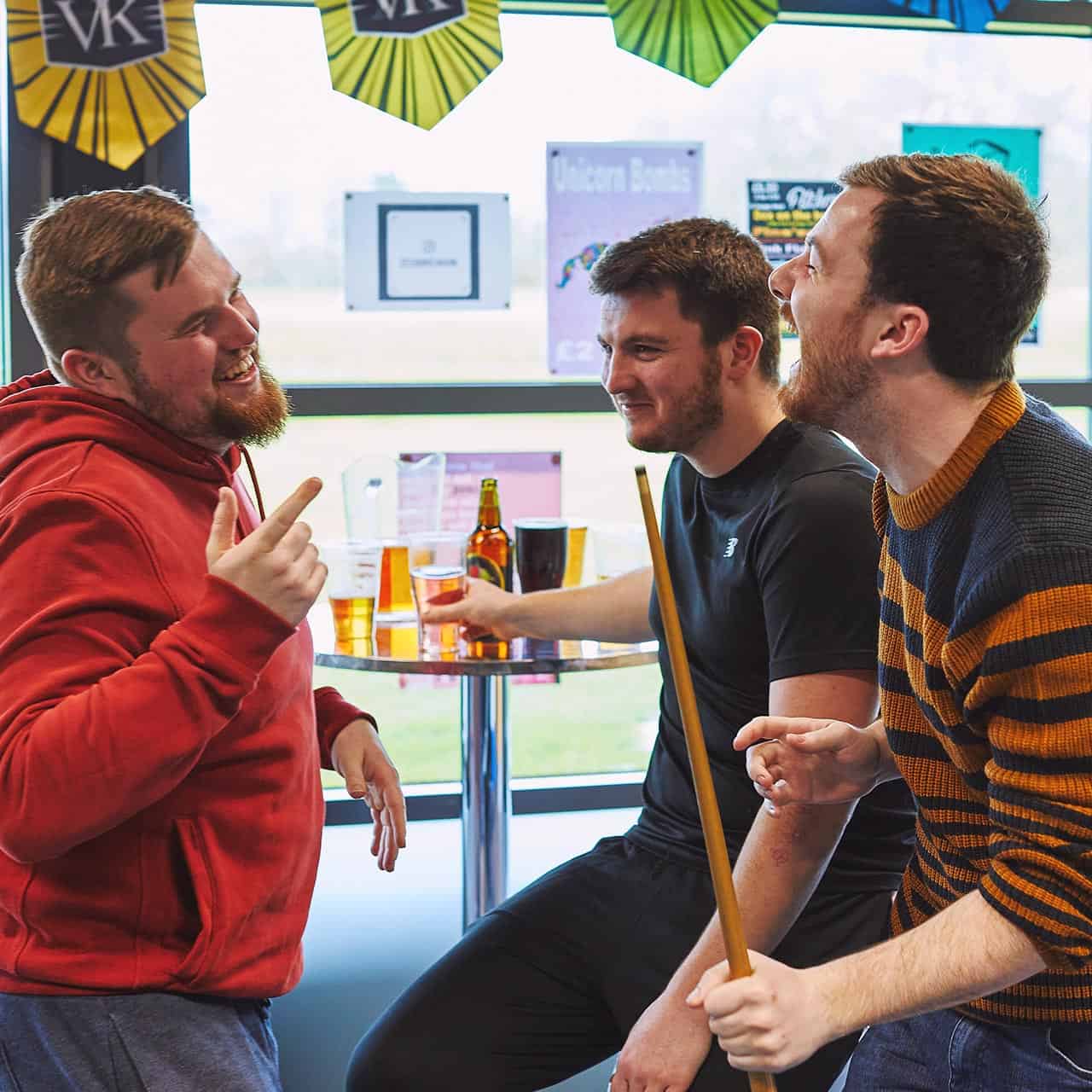 Students playing Pool