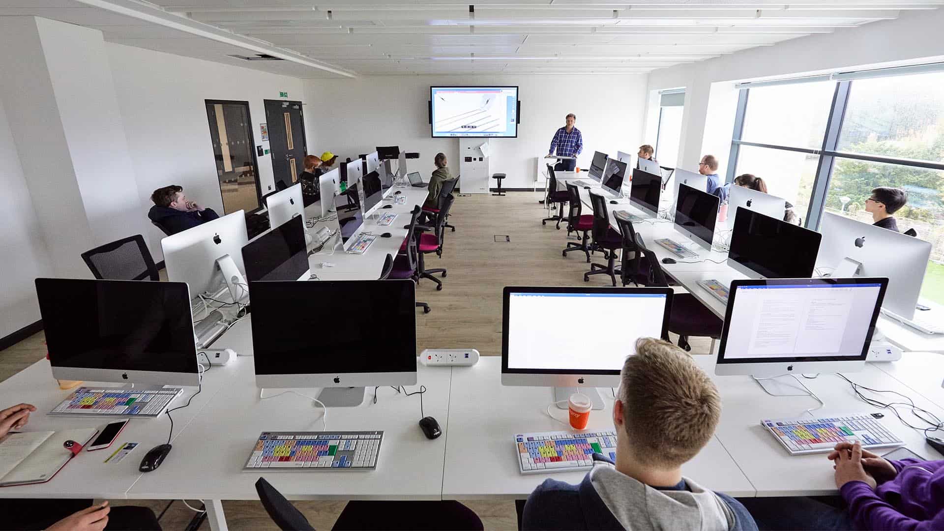 21 Tech Park Creative Industries MAC Suite 1920 X 1080 1 students working during a creative industry lecture
