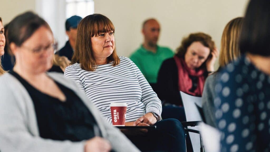 Counselling student sat in a class