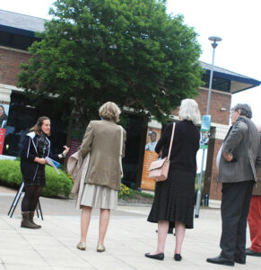 Staff member speaking outside LRC