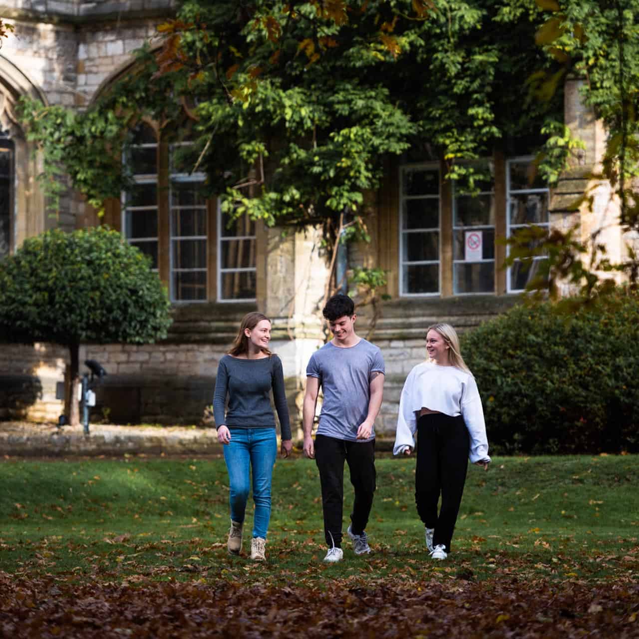 Students walking in Cloisters lawn