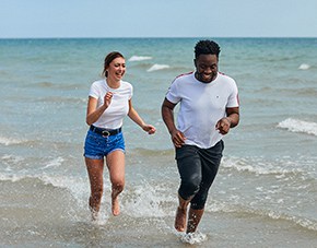 students running on Bognor beach