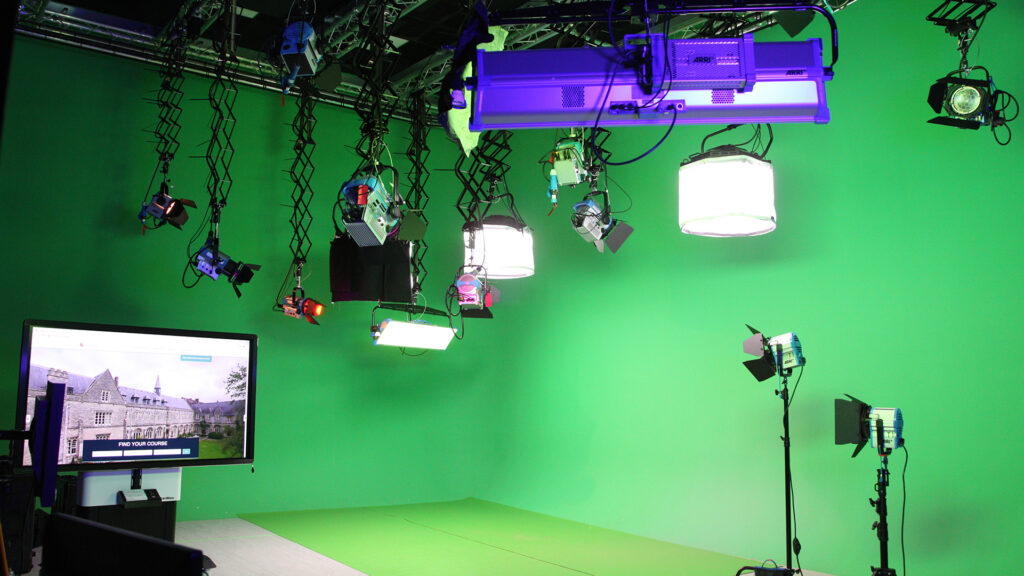 Green screen room with cameras and lighting