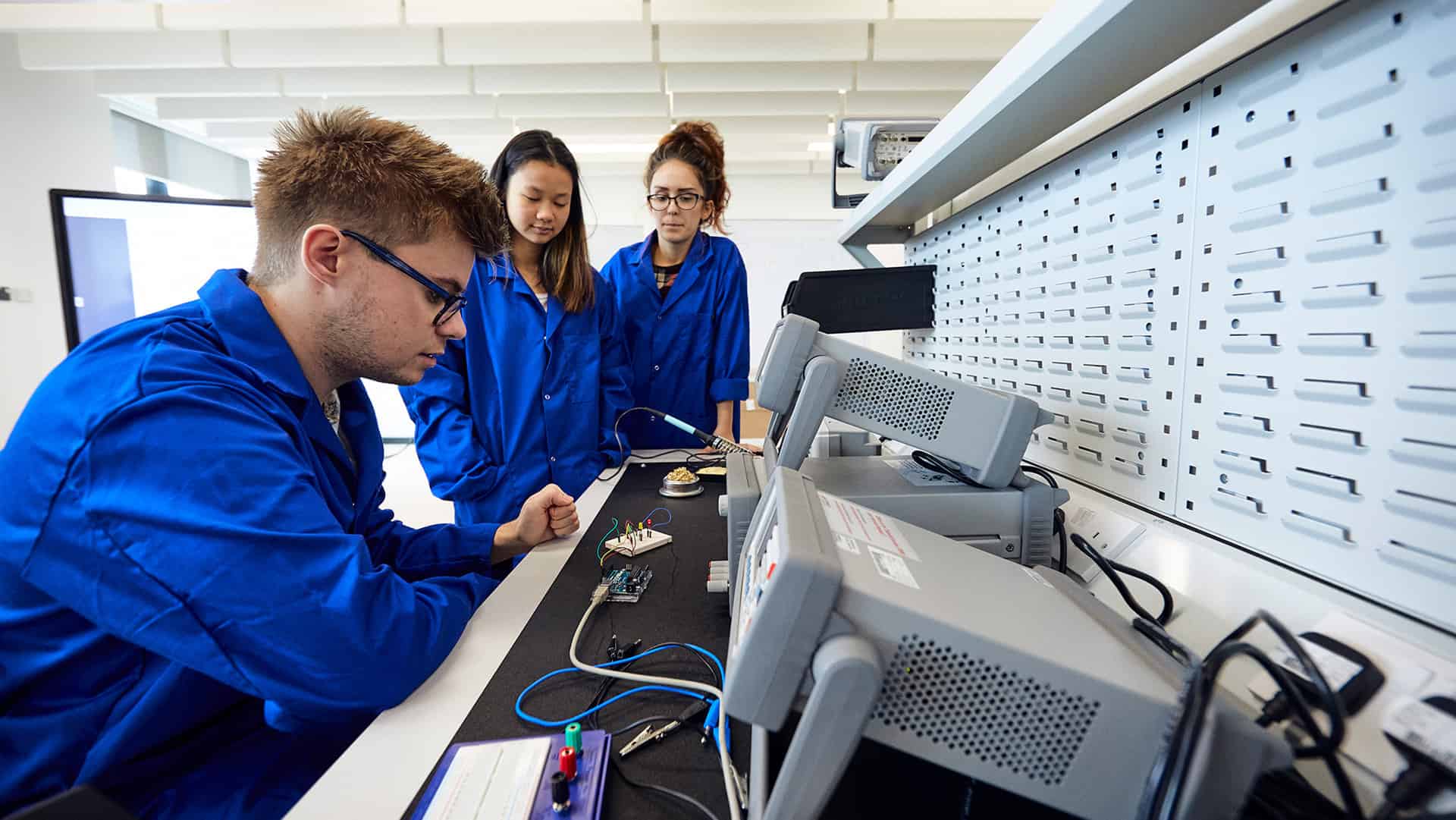 Electrical engineering students working on project