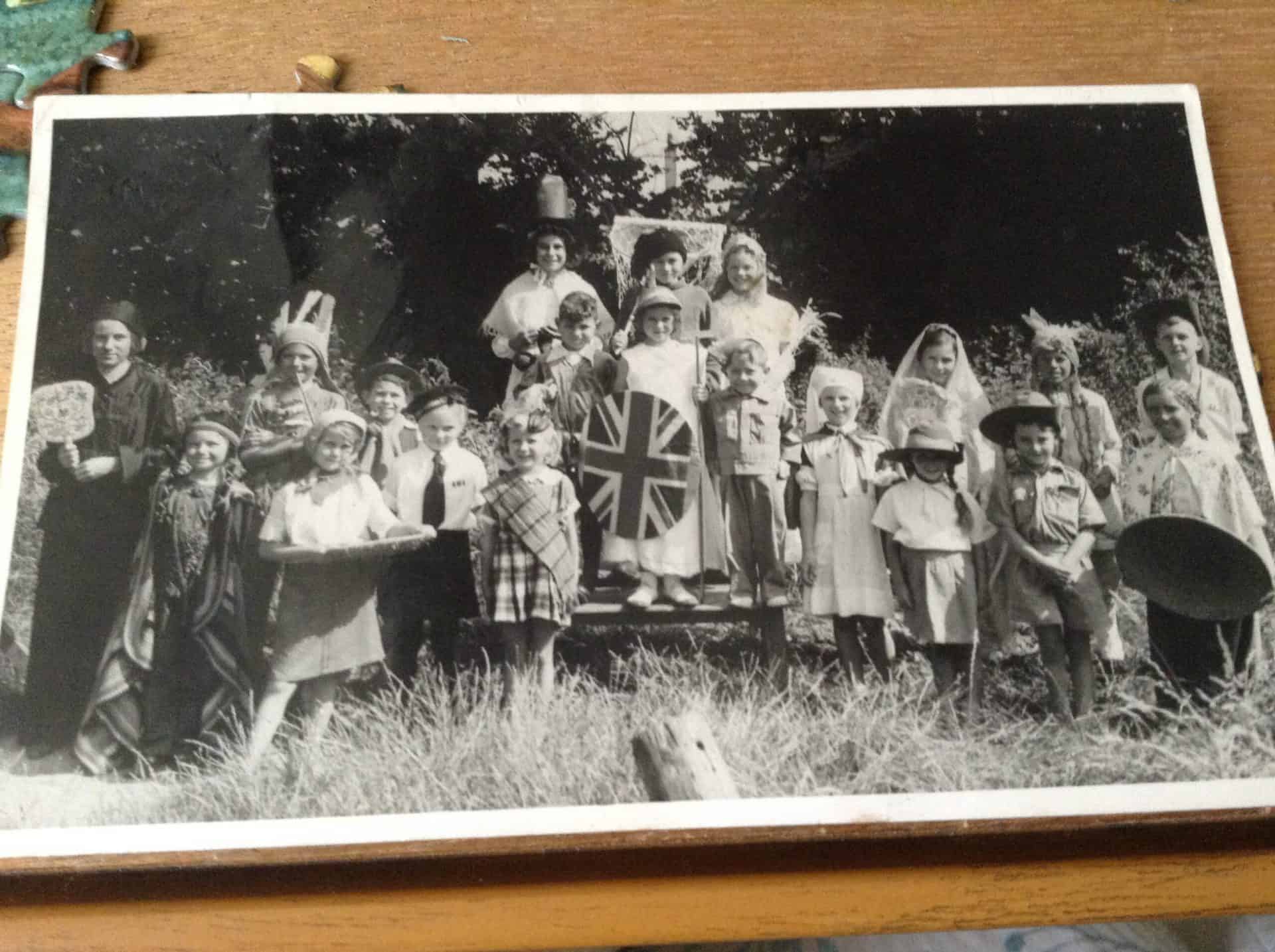 Children smiling in black and white photo
