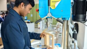 student working on woodwork