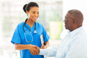 Nurse shaking hands with patient