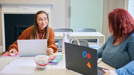 education students sat in a lecture smiling