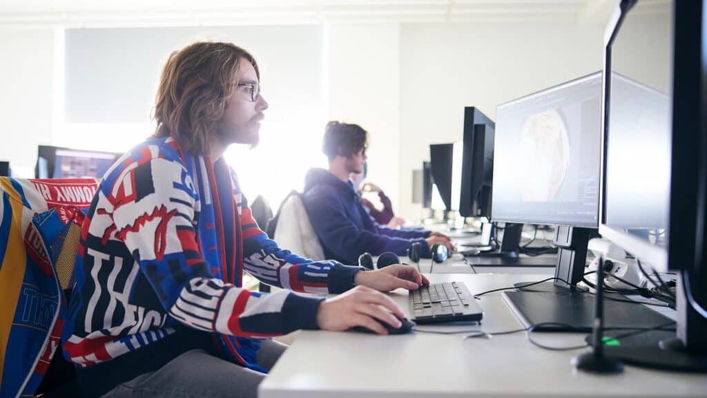 Students sat at computers in an engineering lecture