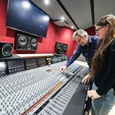 student and lecturer in the recording studio