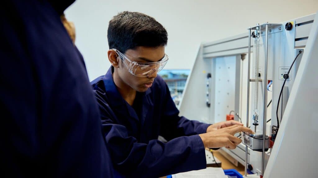 Engineering students in a practical