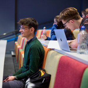 students sat in a screenwriting lecture
