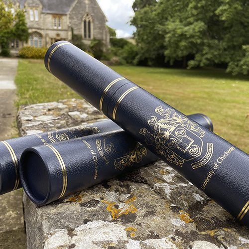 three graduation scroll tubes outside cloisters