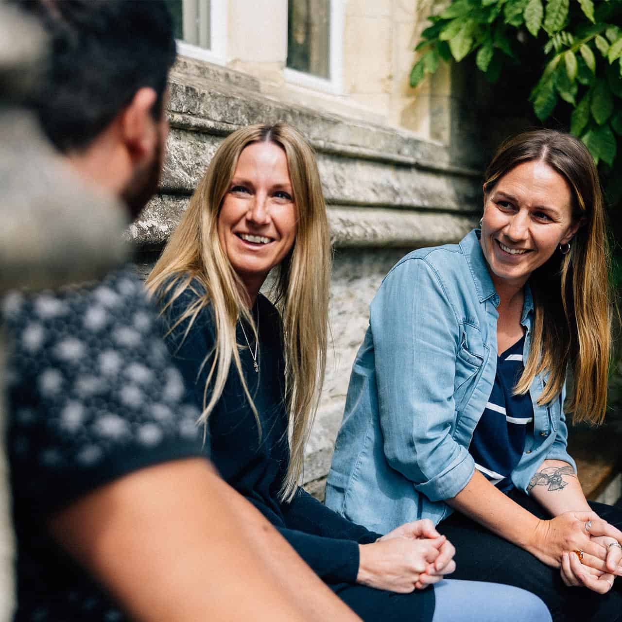 Mature students sat in cloisters