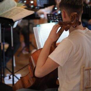 student playing instrument