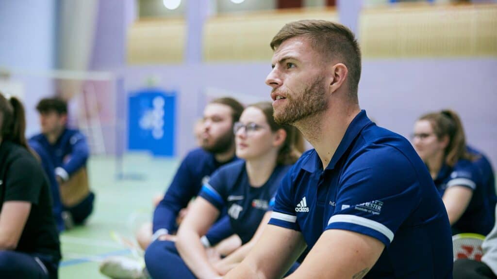 Sports students in a lesson in the sports dome