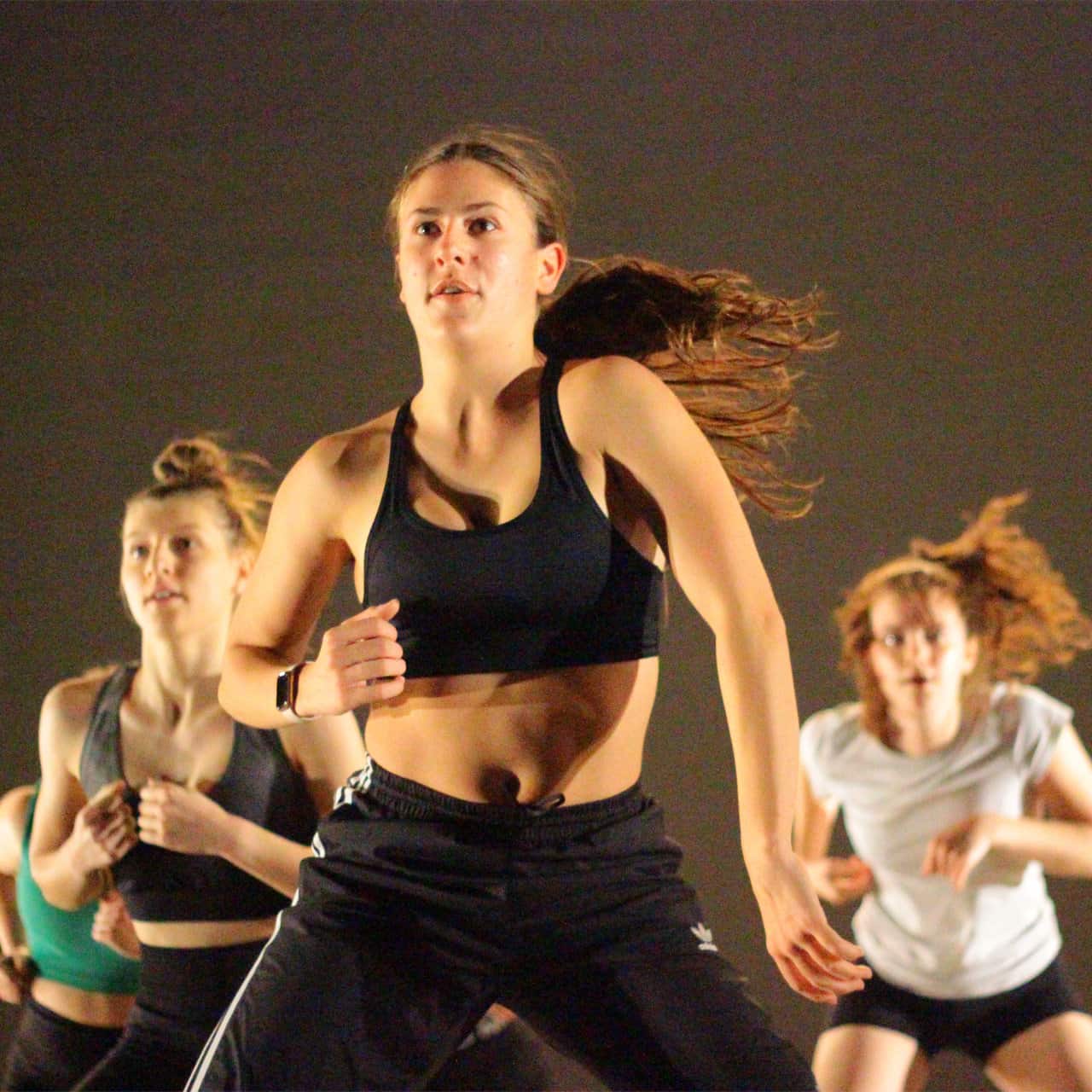 girls rehearsing a dance routine