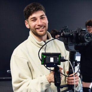 Acting for Film students holding a camera