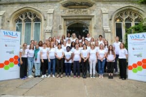 A group of women from around the world who are taking part in the Women's Sports Leadership Academy